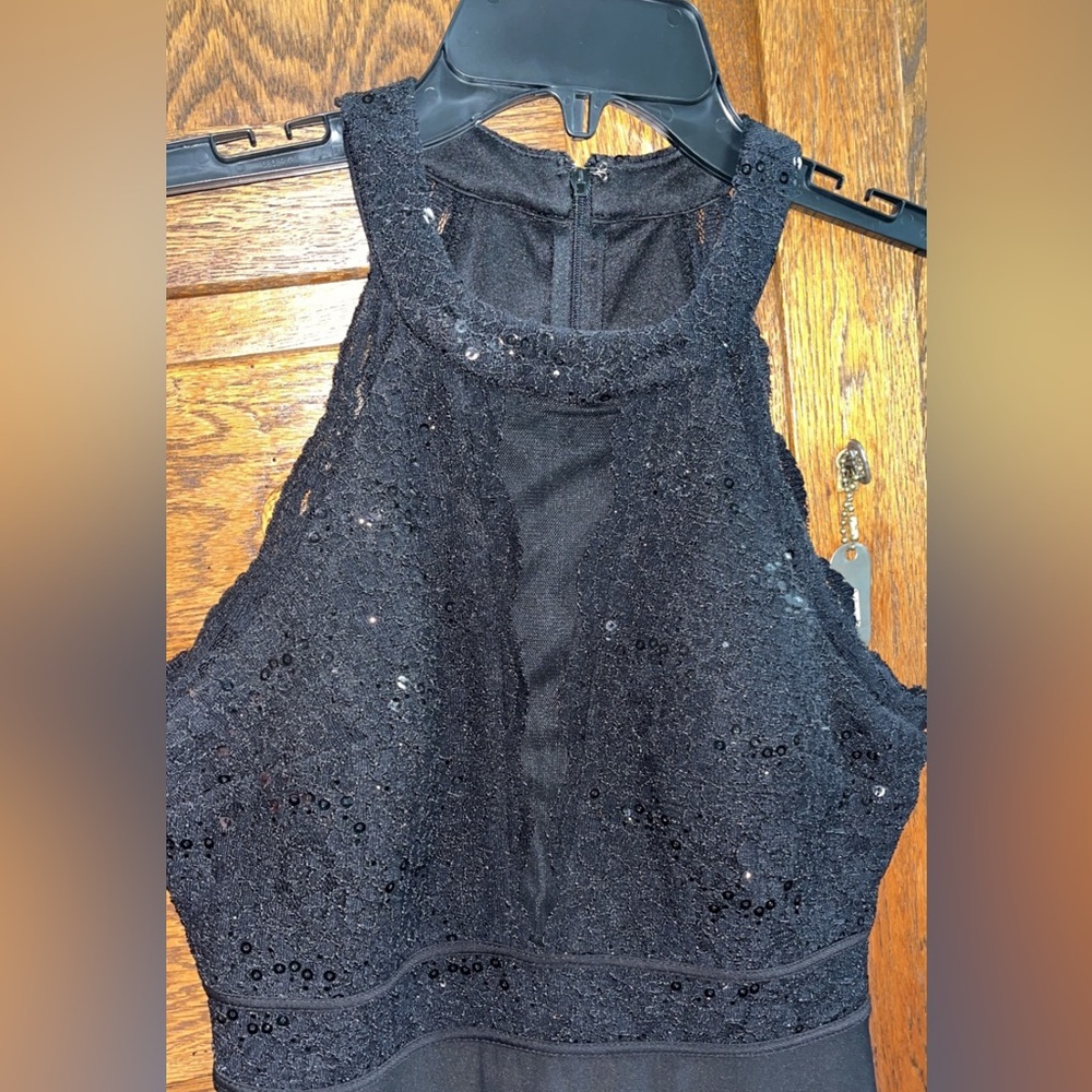Black sparkle knee length homecoming dress. Worn once. Comfy, built in bra